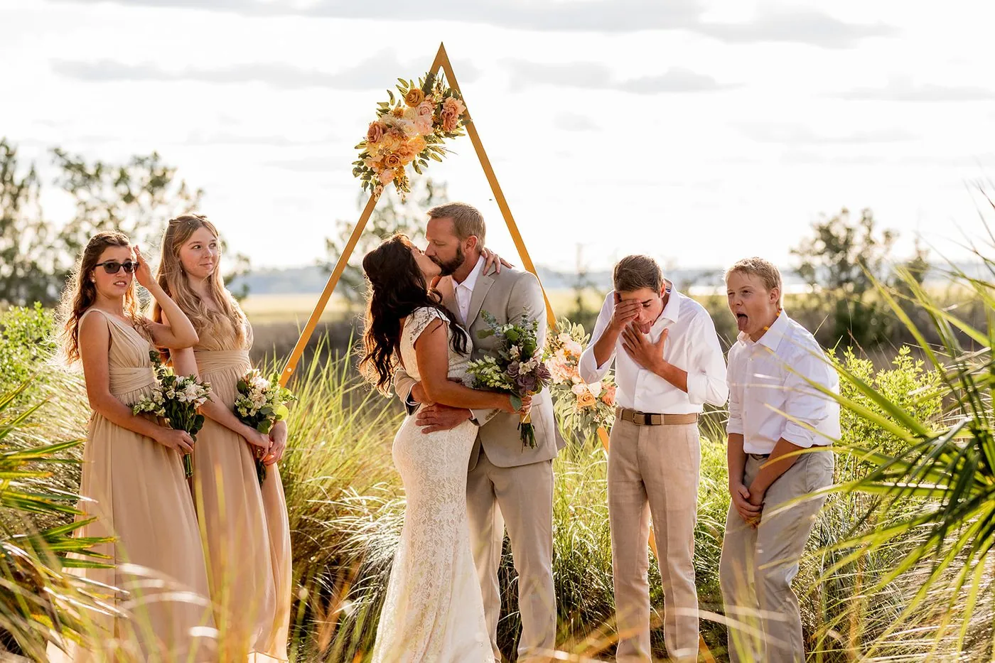 The kids reacting to the first kiss at a marsh ceremony