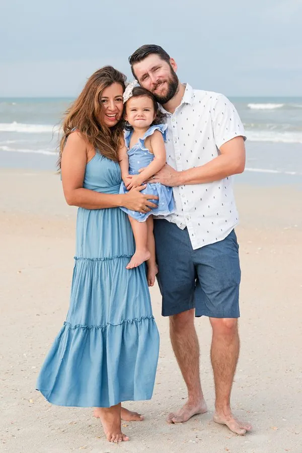 Paola, Leighton and their daughter Lily on the beach