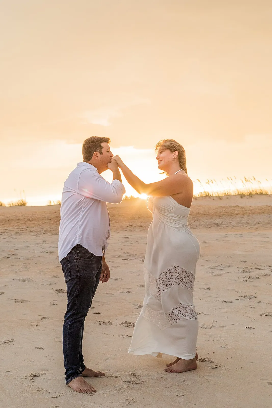 The engagement session on the beach