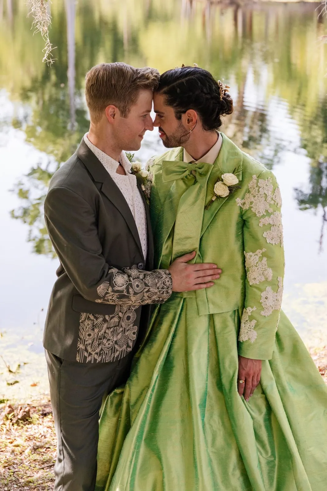 Clay and Zach, two grooms forehead to forehead at a St. Augustine wedding