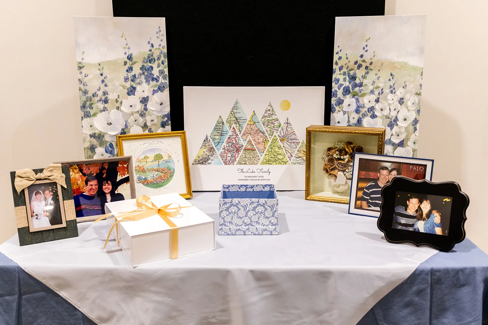 A memory table of photographs from years of marriage
