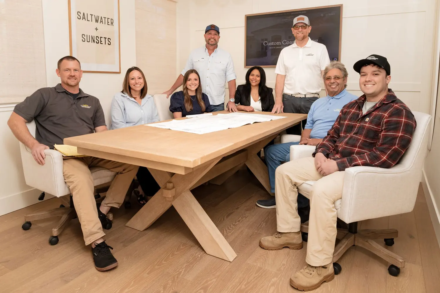 Team portrait photographed at the Saltwater Homes office