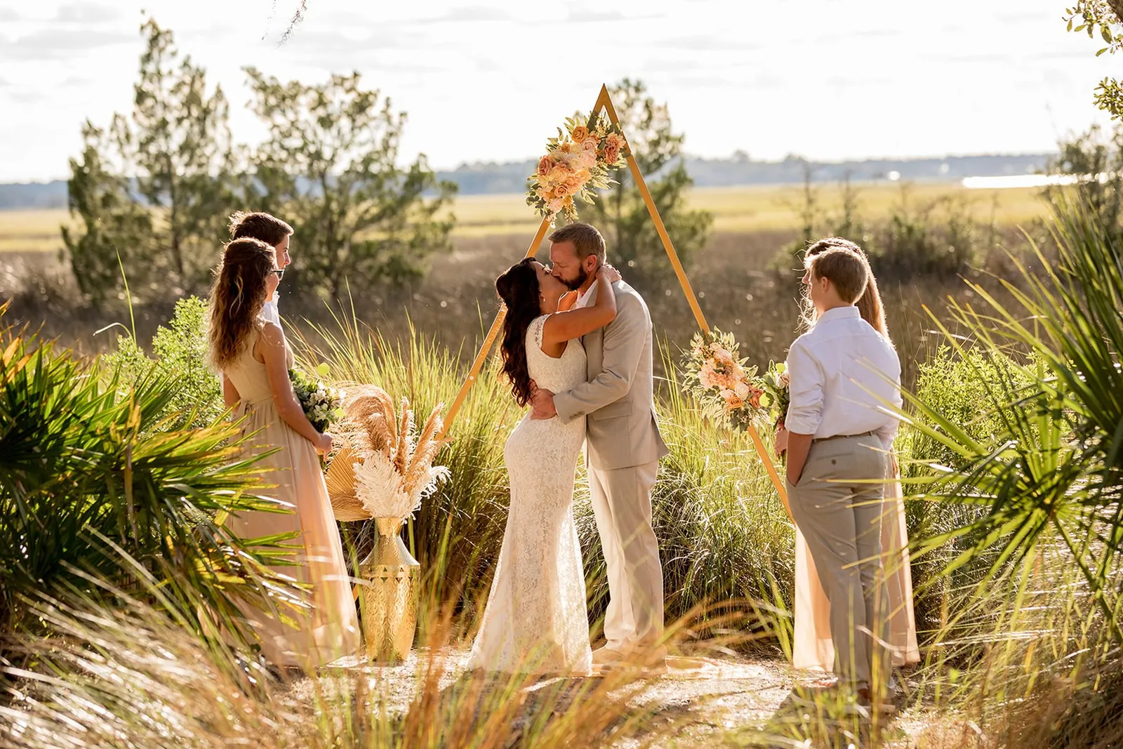 Golden-hour marsh ceremony first kiss on Florida's Historic Coast