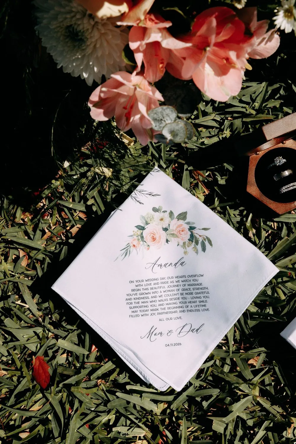 Personalized wedding handkerchief and rings detail at a backyard wedding in Florida